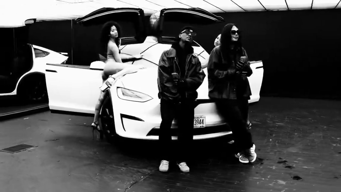 Still from SPONSORED: black-and-white car scene.
