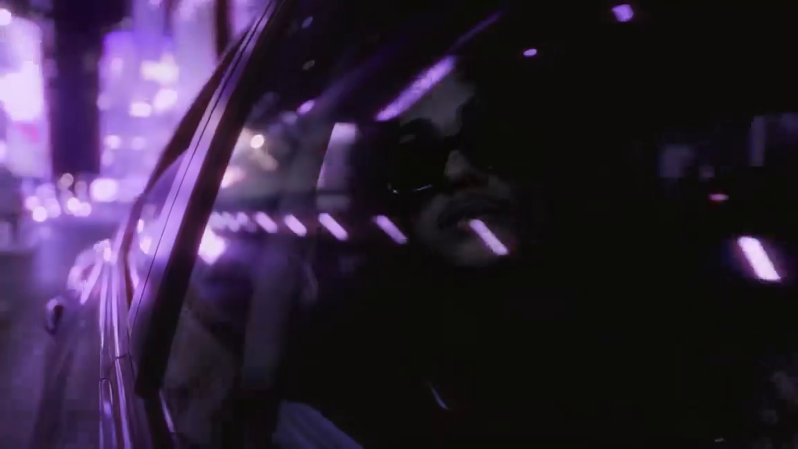 Still from TOO MANY: purple city reflections.